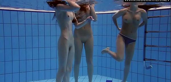  Three hot bitches naked in the pool